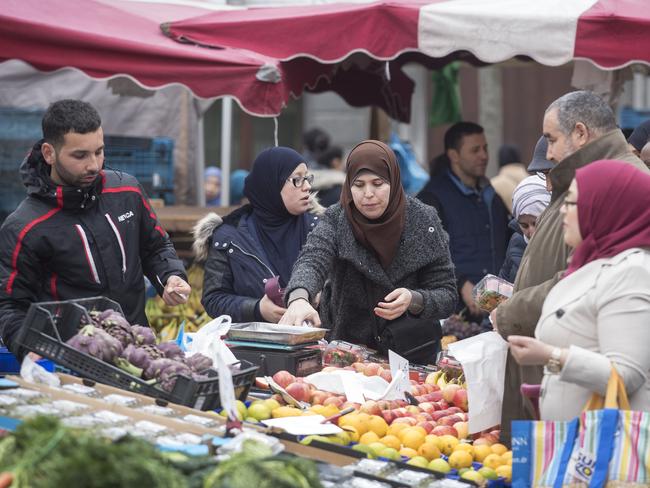 People strolling and shopping in the main square in Molenbeek during market day. Picture: Ella Pellegrini.