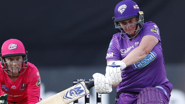 Hurricanes' Rachel Priest smashes down the ground during the WBBL match between the Sydney Sixers and Hobart Hurricanes at the Sydney Showground. Picture. Phil Hillyard