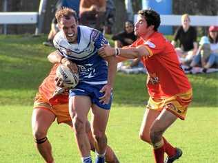 HELD UP: Ghosts centre Dylan Collett is halted by the Coffs Harbour Comets defence in the defeat last weekend. Picture: Amy Hodge