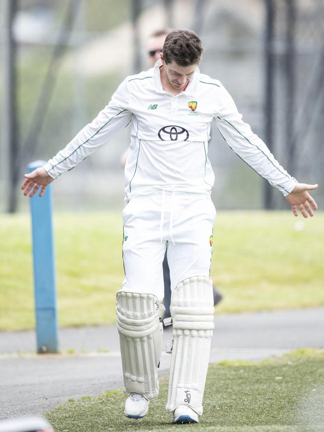 Tim Paine with Tas 2 team mates at Lindisfarne. Picture Eddie Safarik