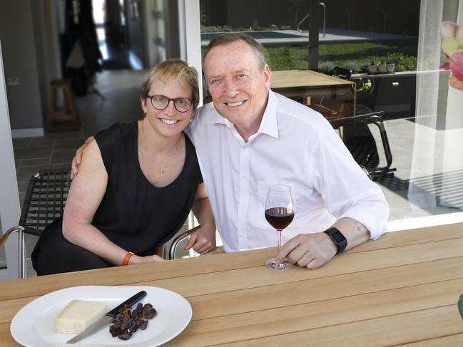 Winemaker, John Colvin, and his wife Robyn, enjoying a glass of wine out the back of their Mosman home. Picture: AAP Image/Quentin Jones