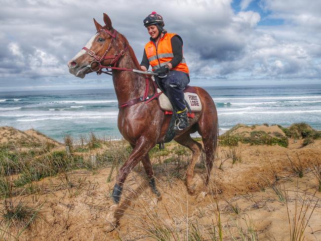 The Darren Weir trained Real Love with Maddie Raymond leading the mare on a dunes session at Warrnambool. Picture: Colleen Petch.