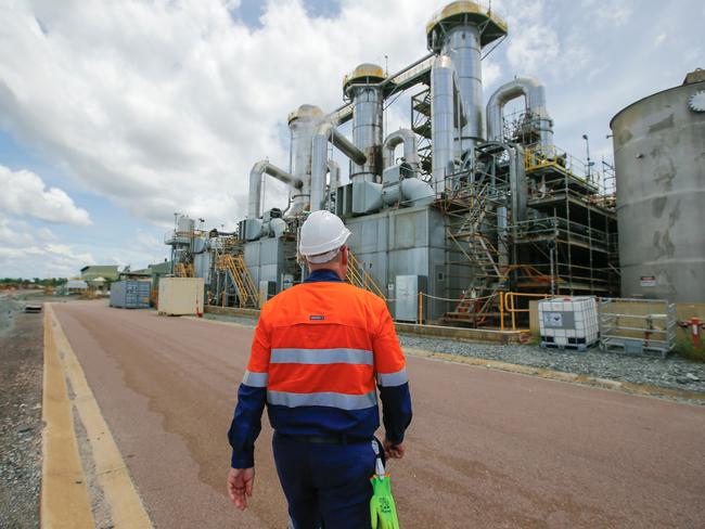 A worker walks past the brine plant on the last day of production at ERA's Ranger mine at Jabiru. Picture: Glenn Campbell