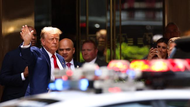 Former US President and Republican presidential candidate Donald Trump leaves Trump Tower in New York City.