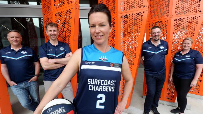 Surfcoast Chargers head coach David Scott (second from the left) with Mel Jackson (player) and SBA board members Adam Forde, Leon Sayers and Rebecca Lewis at Wurdi Baierr Stadium. Picture: Mike Dugdale