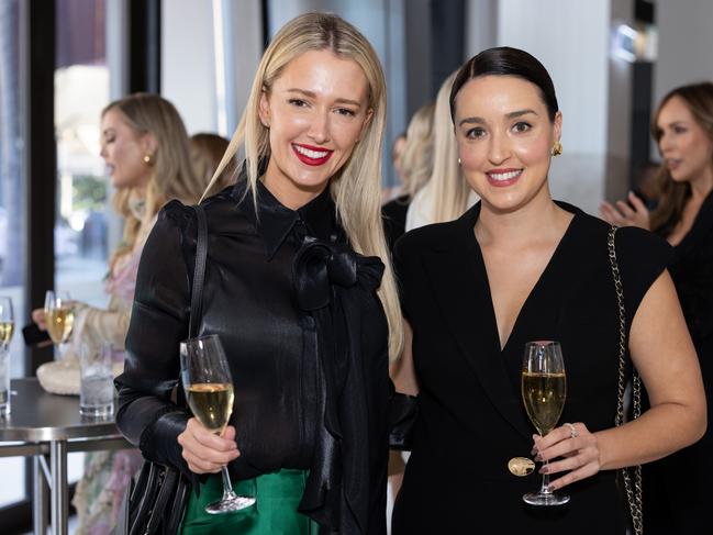 Carla Martin and Sarah Andrews at Fuelled by Fashion Porsche luncheon at the Langham Hotel Gold Coast. Photo: Celeste Humphrey