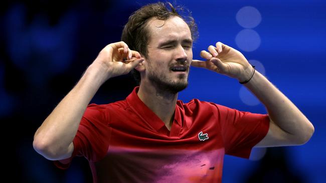 Daniil Medvedev celebrates winning. Photo by Clive Brunskill/Getty Images.