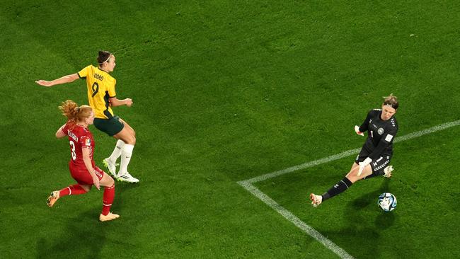 Caitlin Foord snuck it past the keeper. Photo by DAVID GRAY / AFP.