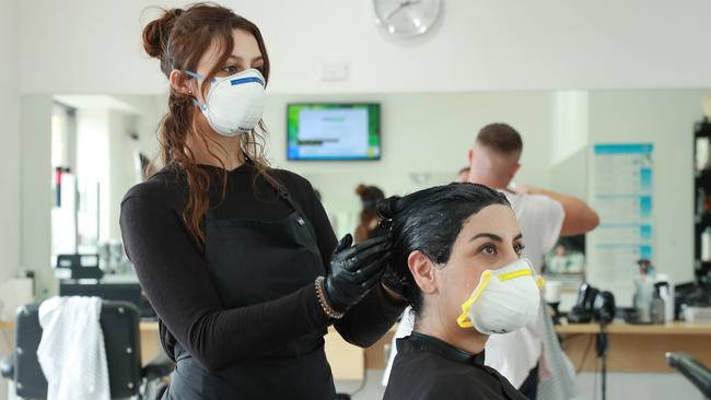 Sydney hairdresser Jasmin Assaf with client Jackie Khoury. Picture: John Feder