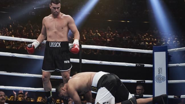 Darcy Lussick floored Justin Hodges with a devastating right hand. Picture: Getty Images