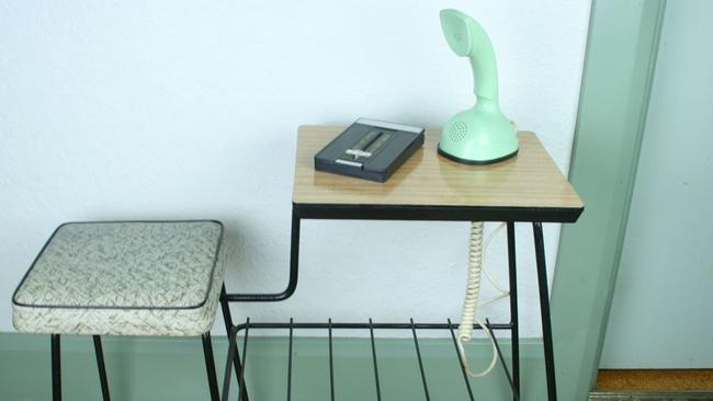 A teledex and a phone table from the 1950s.