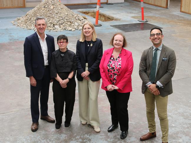 St Vincent de Paul Housing Australia CEO Graham West, Housing Tasmania CEO Eleri Morgan-Thomas, Federal member for Franklin Julie Collins, Senator Carol Brown and member for Clark Simon Behrakis at the former Vinnies shop now the site of the 38 apartment development on Argyle St. Picture: Elise Kaine