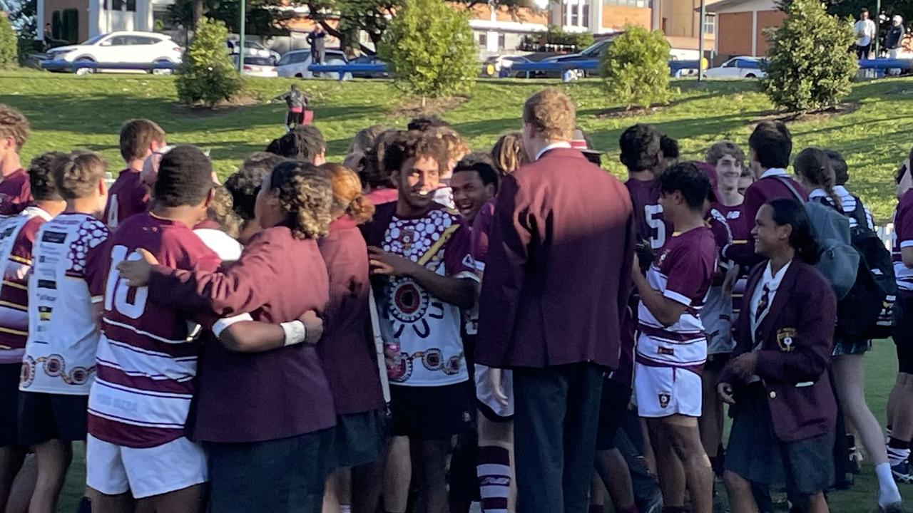 St Peters players and supporters celebrate the win.