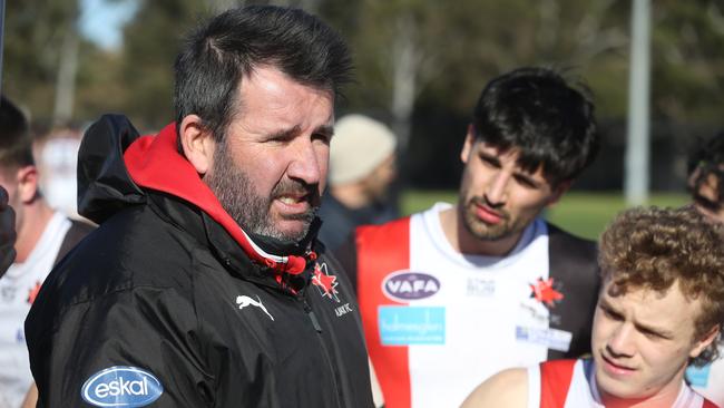 Adam Andrews speaking to his side during their 23-point loss to minor premiers University Blacks in round 14. Picture: Stuart Milligan