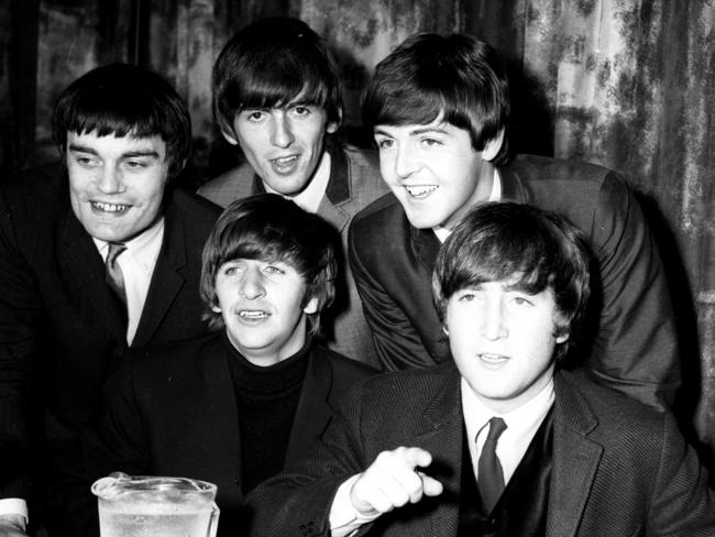 The Beatles — plus fill-in drummer Jimmie Nicol on the left — face the media in Australia in 1964. Picture: Laurie Richards, Arts Centre Melbourne, Performing Arts Collection