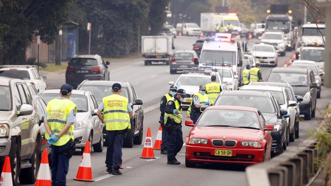 Police set up road blocks at Lilyfield on the City West Link. Picture: Sam Ruttyn