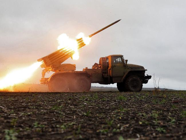 TOPSHOT - A BM-21 'Grad' multiple rocket launcher fires towards Russian positions on the front line near Bakhmut, Donetsk region, on November 27, 2022, amid the Russian invasion of Ukraine. (Photo by Anatolii STEPANOV / AFP)