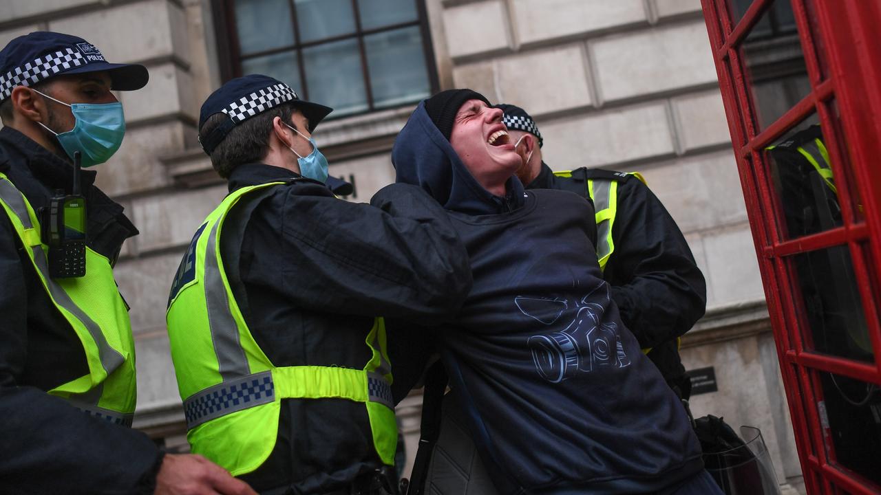 A man is arrested during an anti-lockdown protest in London on Saturday. Picture: Peter Summers/Getty Images