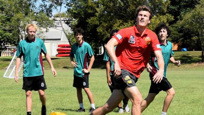 Gold Coast Suns AFL player Charlie Ballard at a training session held on O'Loughlin Catholic College grounds for middle school students. Picture: Sierra Haigh