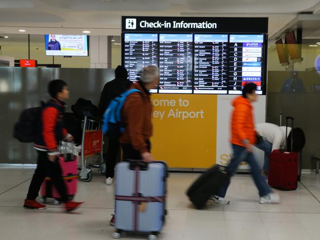 SYDNEY, AUSTRALIA  - AUGUST 15 2023: A general view of the Departures Terminal at Sydney International Airport, after a man who forced a Malaysia Airlines plane to make a dramatic turn back to Sydney International Airport after he became unruly and made references to Islam has been arrested. The MH122 Airbus-a330 flight to Kuala Lumpur was diverted back to Sydney and was isolated on the tarmac with AFP officers called to the emergency just before 4pm on Monday. Picture: NCA Newswire / Gaye Gerard