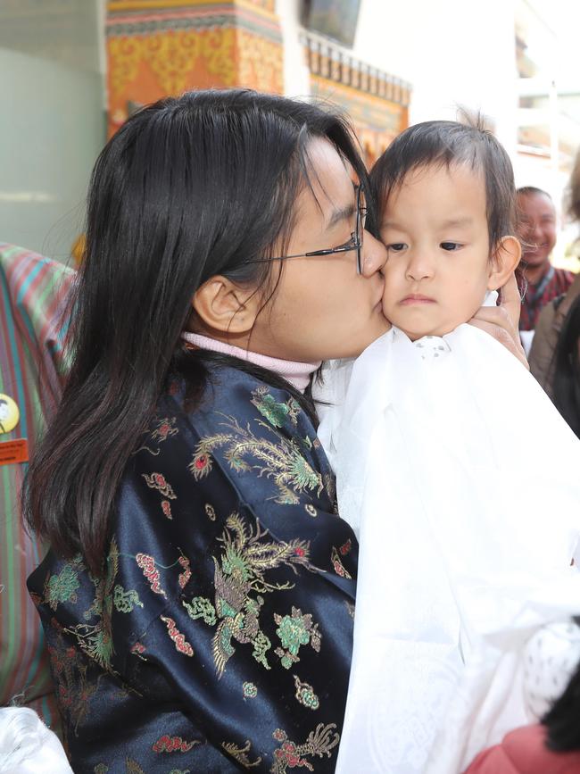 The twins’ sister, Ugyen Choden, holds Nima. Picture: Alex Coppel. 