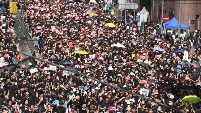 Protesters attend a rally against a controversial extradition law proposal in Hong Kong on Sunday. Picture: AFP/Anthony Wallace