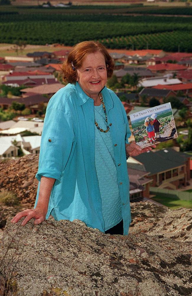 Barbara Mackay, widow of the murdered anti-drugs campaigner Donald Mackay with the book she wrote extolling the town of Griffith's virtues.