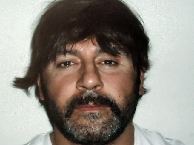 Tony Mokbel, wearing his infamous wig, fled justice in Australia but was tracked to Greece. Picture: AFP