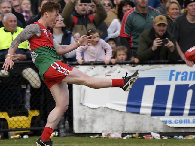 The Pines Aaron Ludewig kicks the winning point after the siren during the MPNFL Division 1 grand final between The Pines and Sorrentoin Frankston, Sunday, Sept. 16, 2018. Picture: Andy Brownbill)