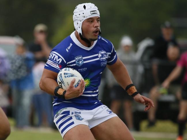 Josiah Tamasi leads the charge for Narellan. Photo: Warren Gannon Photography