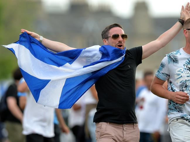 EDINBURGH, SCOTLAND - JUNE 10: Scotland fans invade the field as Scotland beat England by 6 runs during the One Day International match between Scotland and England at The Grange on June 10, 2018 in Edinburgh, Scotland. (Photo by Mark Runnacles/Getty Images)