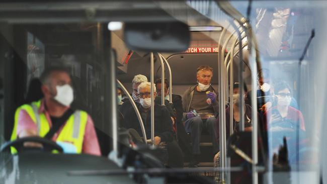 International passengers are loaded onto airport Sky buses and taken to various hotels in Melbourne. Picture: David Crosling