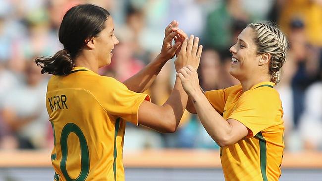 Sam Kerr celebrates a goal with Katrina Gorry.