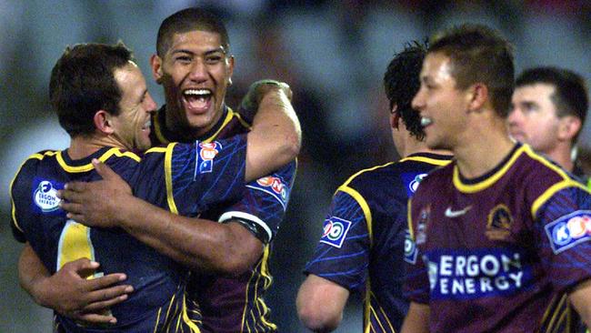 Stuart Kelly, Robert Tanielu and Scott Prince after the Baby Broncos’ win. Picture: Brett Costello