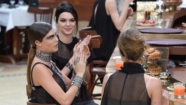 Cara Delevingne and Kendall Jenner at Paris Fashion Week. | news.com.au ...