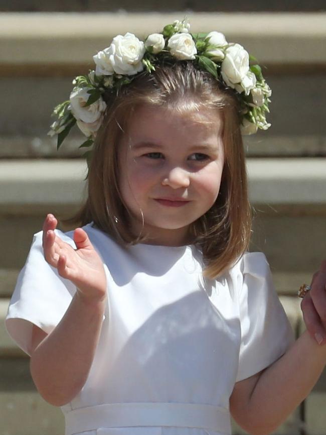 Princess Charlotte was not fazed by the global interest in the wedding of Uncle Harry. Picture: AFP