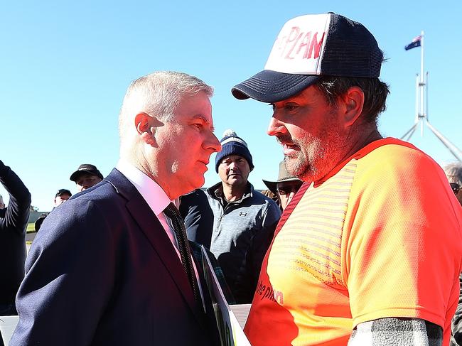 Deputy PM Michael McCormack gets upclose with while meeting with people at the can the plan rally at Parliament House in Canberra. Picture Kym Smith