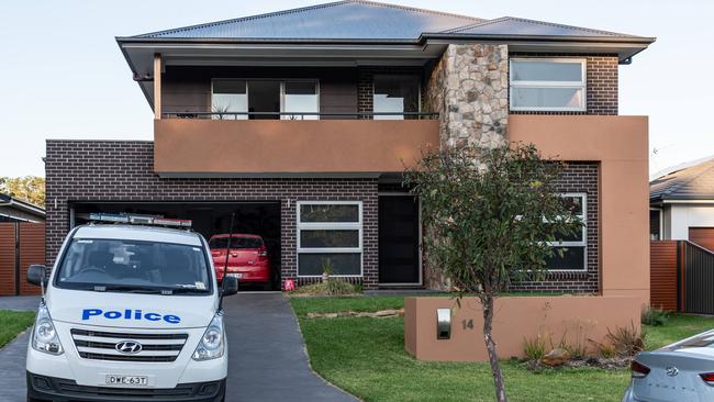 Police pictured outside Mr Schwartz’s home in Harrington Park. Picture: Monique Harmer)