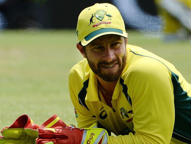 SPORT - Cricket ODI, Australia vs India, at the WACA, Perth. Photo by Daniel Wilkins. PICTURED- Australia's wicket keeper Matthew Wade lays on the turf after failing to glove the ball off a Josh Hazlewood delivery