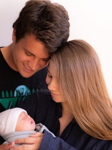 BIndi Irwin and husband Chandler with their baby Grace.