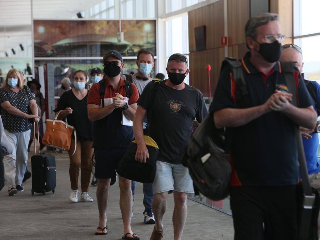 ADELAIDE, AUSTRALIA - Advertiser Photos FEBRUARY 1 Monday 2021: Passengers arrive at Adelaide Airport fromVirgin Airlines flight VA712 departing Perth arrived in Adelaide at 12.20pm Gate 14Adelaide Airport. S.A.SA has shut to WA without public warning. Anyone who arrived in SA from WA after 10.15pm last night without an exemption will be turned away. Anyone who visited WA from Jan 26 needs to go into immediate 14 day quarantine.Picture: Emma Brasier.