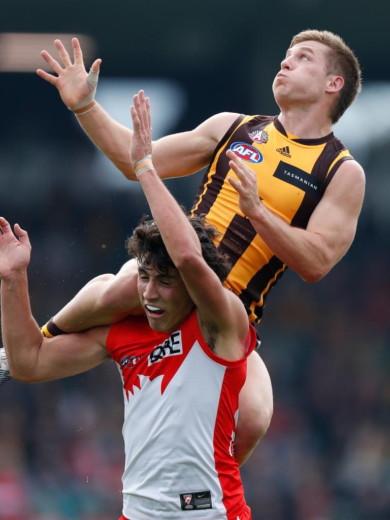 Hawks forward Dylan Moore takes off. Picture: Michael Willson/AFL Photos via Getty Images