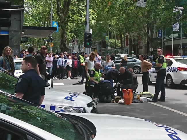 Police and emergency services at the scene. Picture: AAP Image/Luke Costin