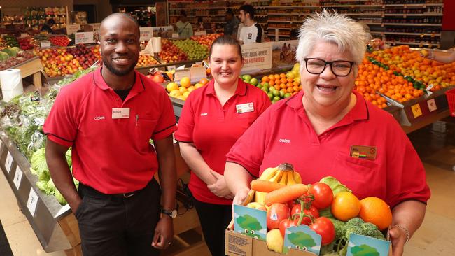 The Entrance Coles staff Richard Otoba, Rebecca Carnell and Rita Zaczek. The store came third in NSW for raising the most money for the SecondBite campaign where customers bought a card for $2. Photo: Sue Graham