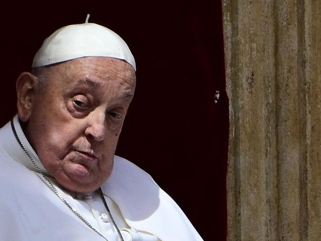 Pope Francis stands at the main balcony of St. Peter's basilica for the Urbi et Orbi message and blessing to the city and the world as part of Easter celebrations, at St Peter's square in the Vatican on April 20, 2025. Picture: AFP