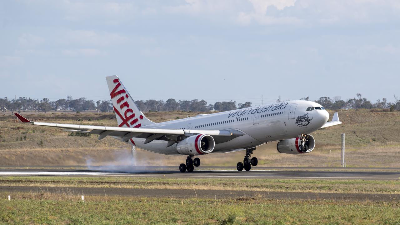 A Virgin Australia Airbus A330-200 lands at Wellcamp Airport for storage. Friday. 25th Sep. 2020