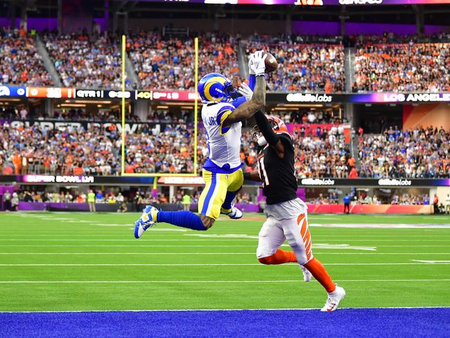 Los Angeles Rams' Odell Beckham Jr. catches the ball and scores a touchdown during Super Bowl LVI between the Los Angeles Rams and the Cincinnati Bengals at SoFi Stadium in Inglewood, California, on February 13, 2022. (Photo by Frederic J. Brown / AFP)