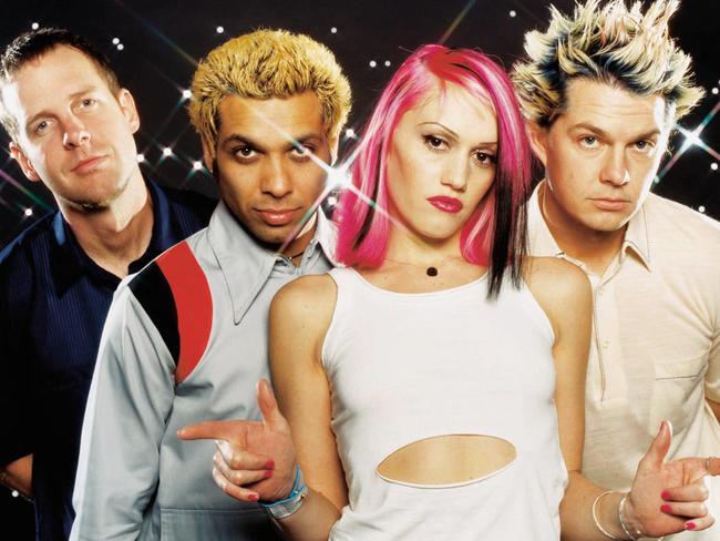 Gwen with her No Doubt band mates — and trademark red lips — in 2000.