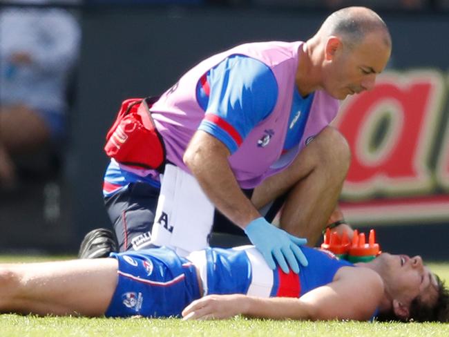 Liam Picken lies prone after being knocked out during a game in 2018.