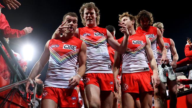 (from left) Tom Papley, Nick Blakey and the rest of the Swans were thrilled with their win over the Saints. Picture: Getty Images